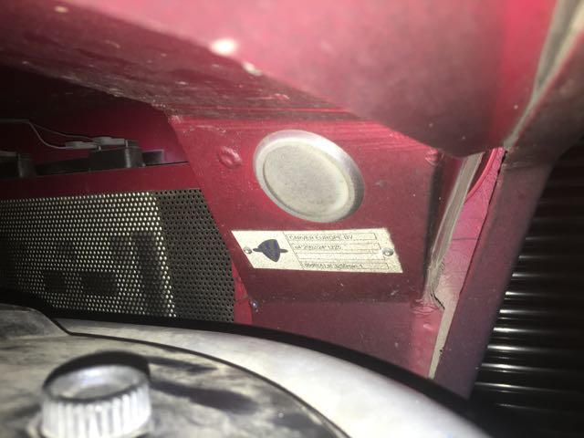 Shows close up where to find VIN plate